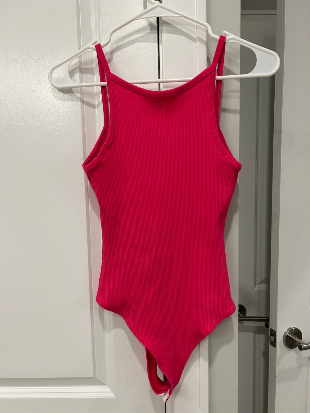 Women’s pick bodysuit with low cut back